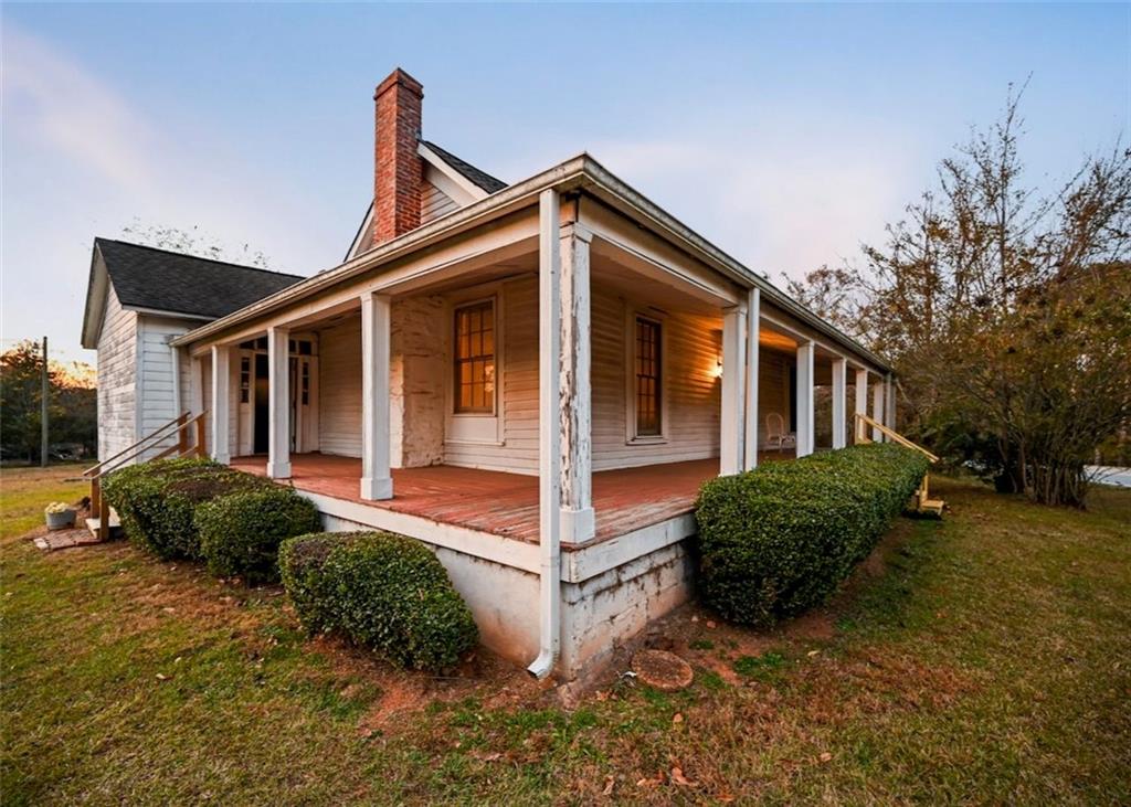 4000 Bostwick Road Madison, GA 30650 - Photo 10 of 34 a view of a house with a yard