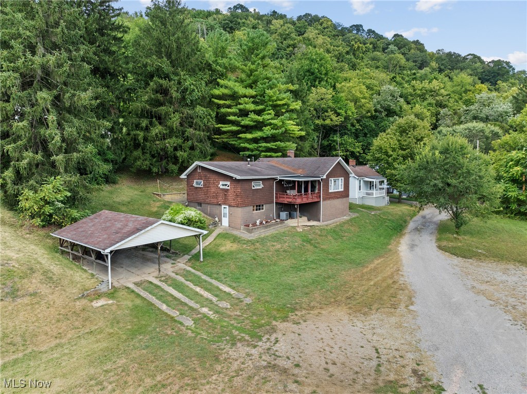 8 Spring Street Bridgeport, OH 43912 - Photo 26 of 34 View of subject property featuring a heavily wooded area