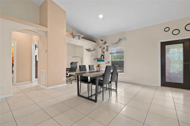 a view of a workspace with furniture