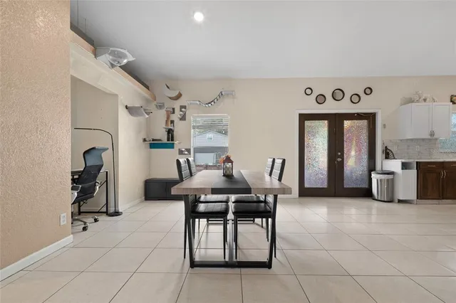 a workspace with furniture and a kitchen