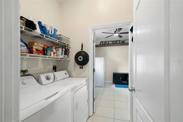a view of entryway and hall with a bath tub