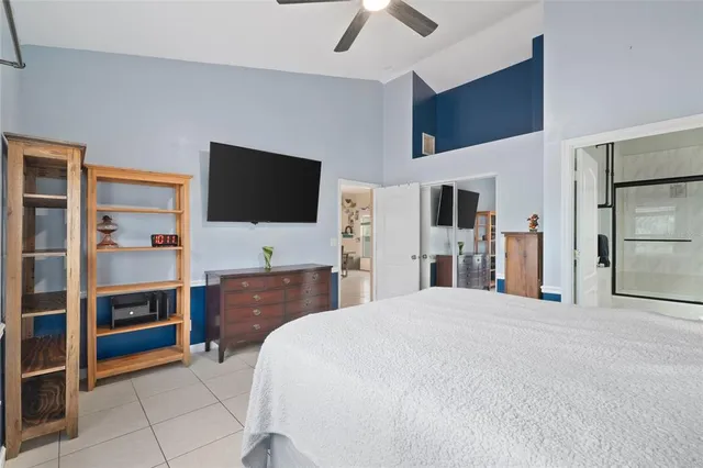 a bathroom with a sink mirror toilet and shower