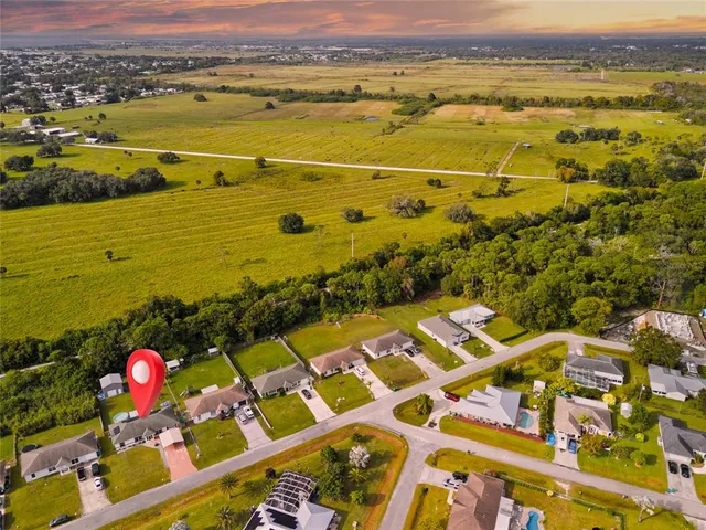 a front view of house with swimming pool