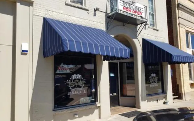 a front view of a house with a balcony