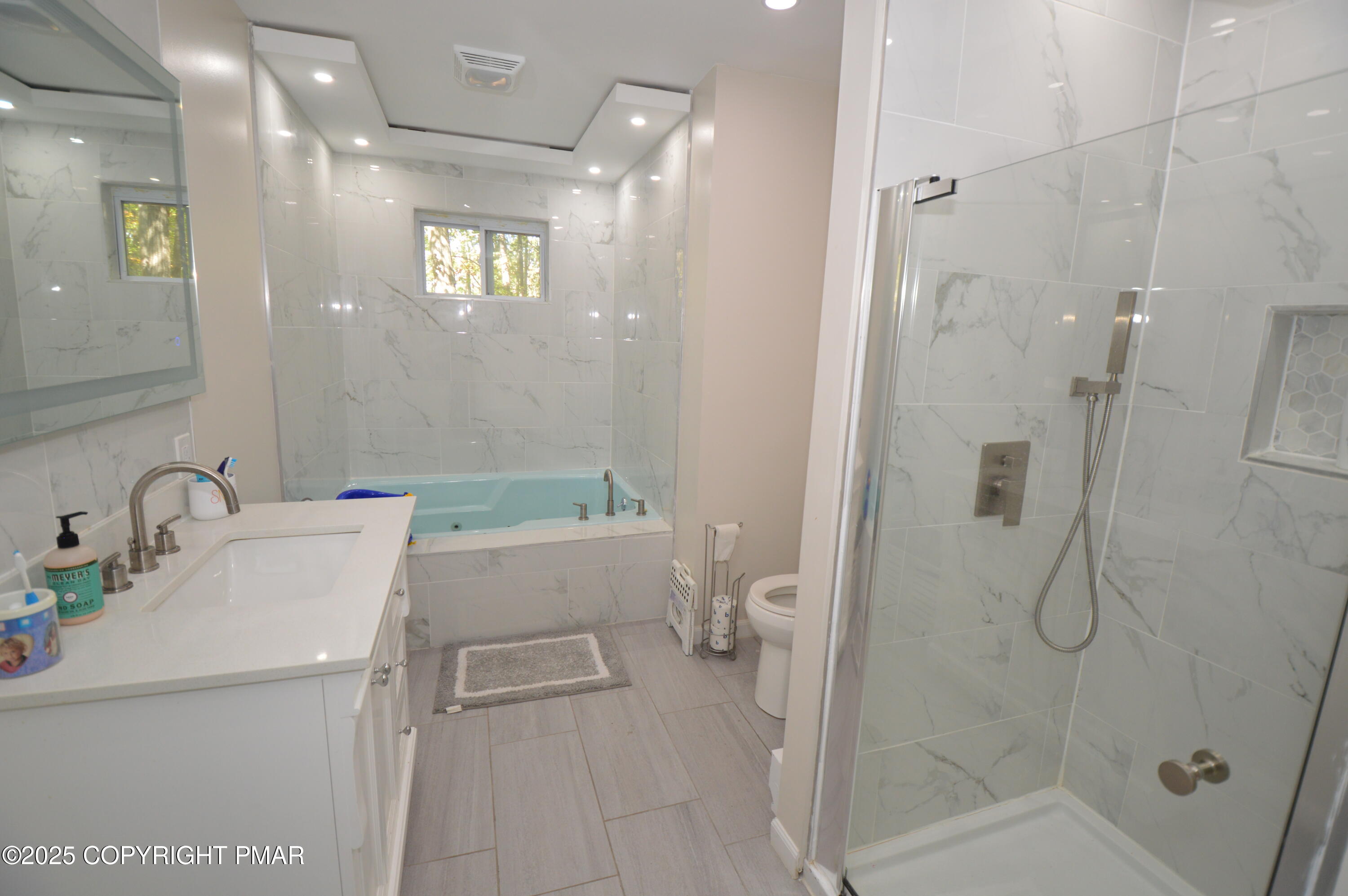 128 Ashley Court Bushkill, PA 18324 - Photo 9 of 43 a bathroom with a sink toilet and shower