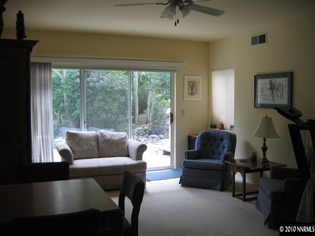 4390 Bitteroot Road Reno, NV 89519 - Photo 6 of 9 a living room with furniture and a window