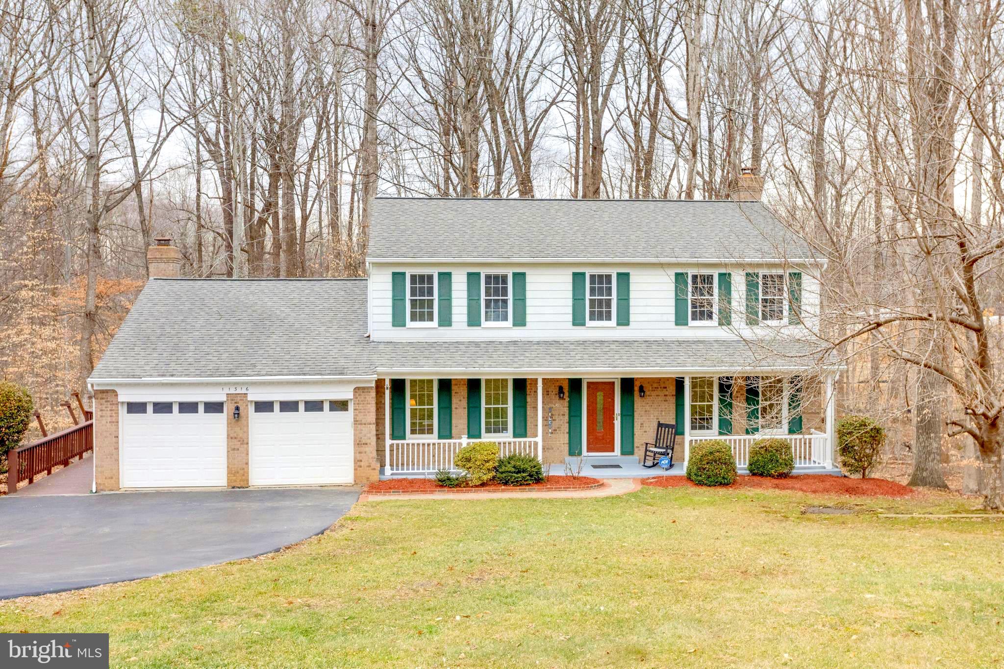 11316 Robert Carter Road Fairfax Station, VA 22039 - Photo 1 of 56 front view of a house with a swimming pool