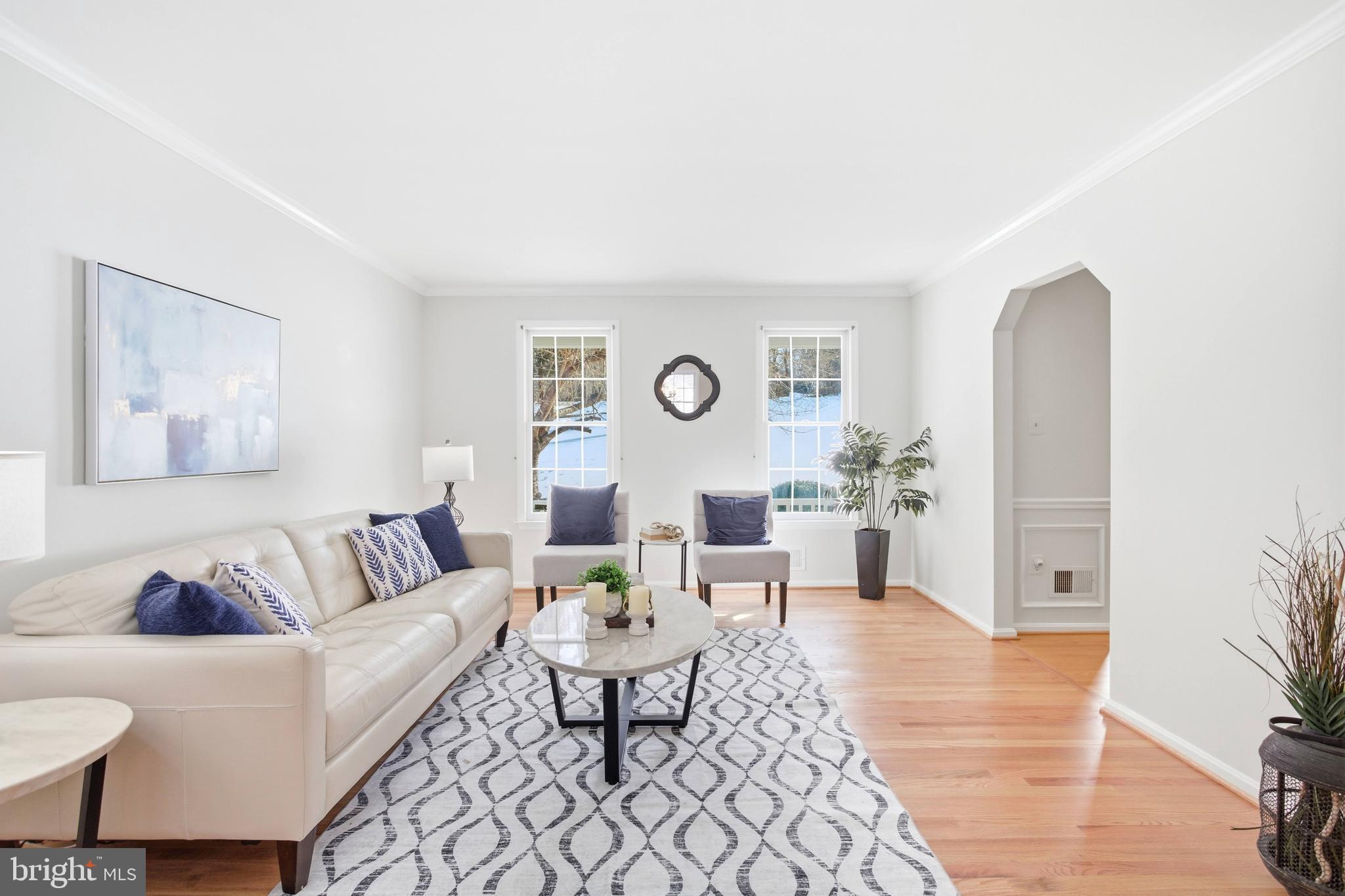 11316 Robert Carter Road Fairfax Station, VA 22039 - Photo 2 of 56 a living room with furniture and wooden floor