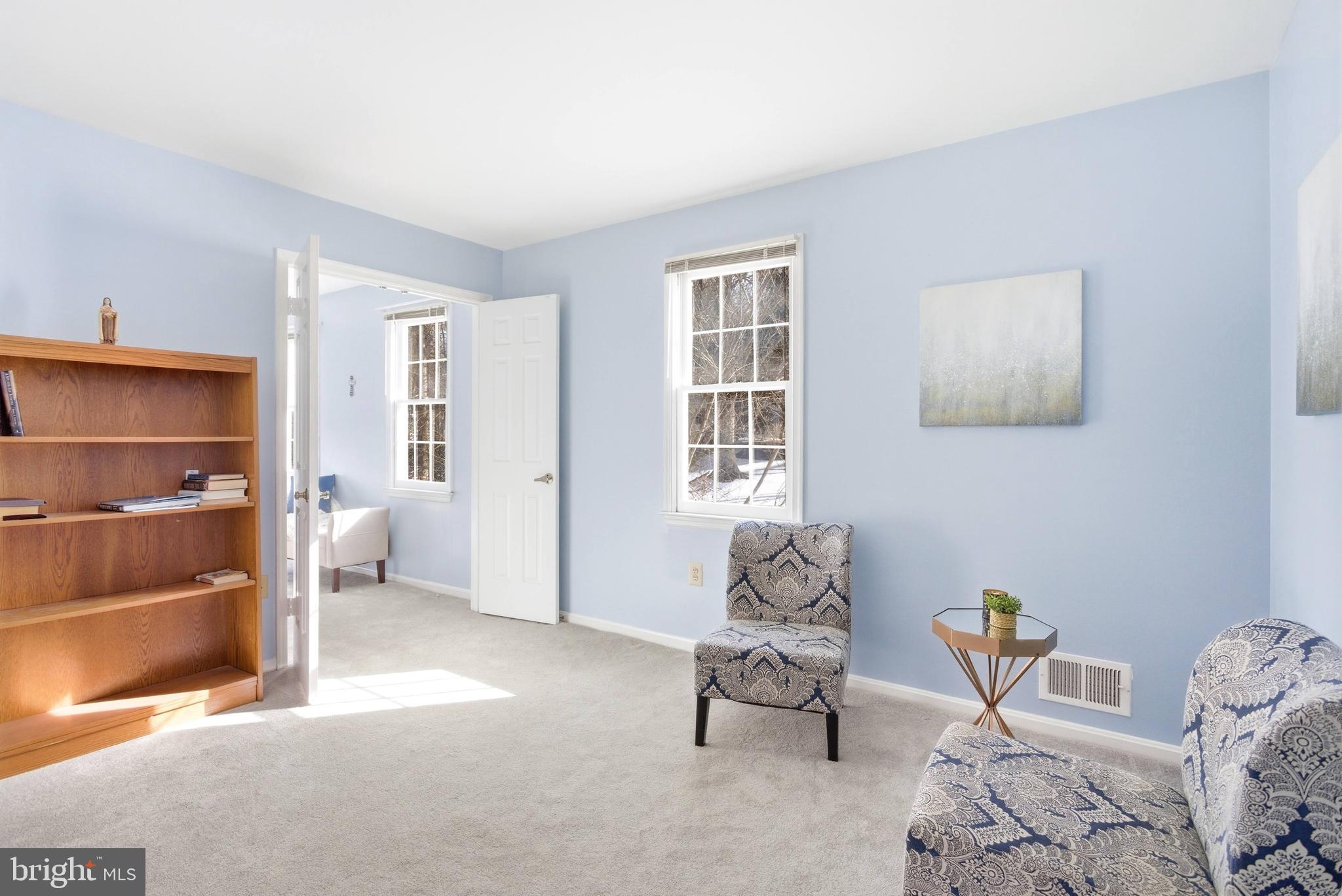 11316 Robert Carter Road Fairfax Station, VA 22039 - Photo 39 of 56 a living room with furniture and a window