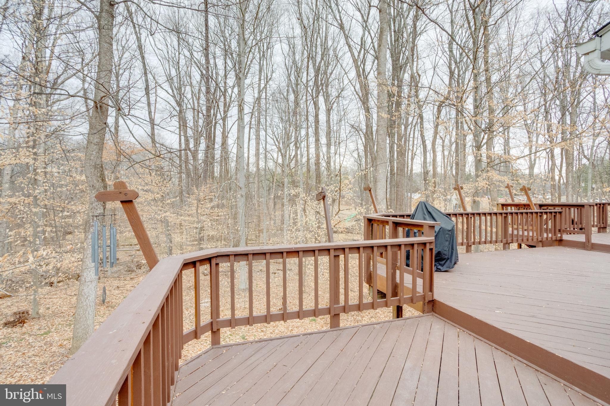 11316 Robert Carter Road Fairfax Station, VA 22039 - Photo 51 of 56 a view of balcony with wooden floor and fence