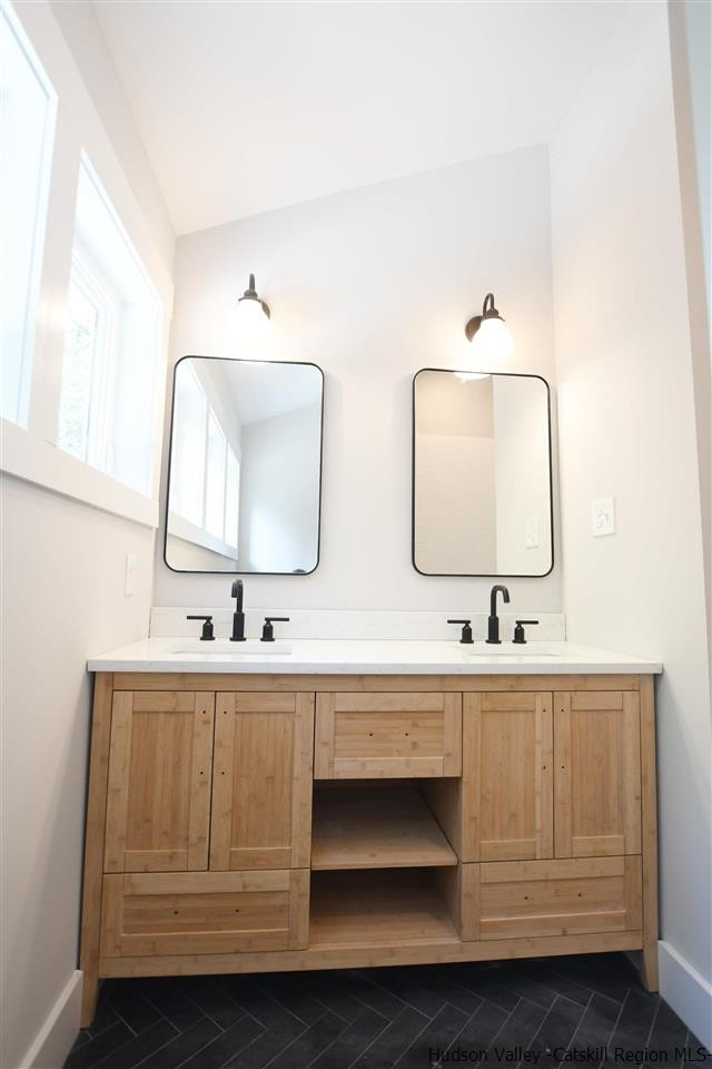 259 Rivka Road Saugerties, NY 12477 - Photo 19 of 29 a bathroom with 2 sink and a mirror