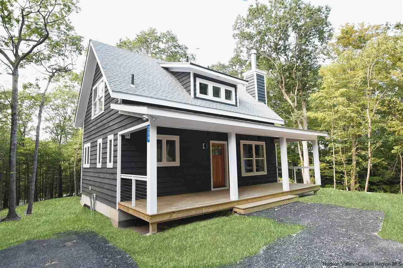 259 Rivka Road Saugerties, NY 12477 - Photo 2 of 29 a view of a house with a yard and large tree