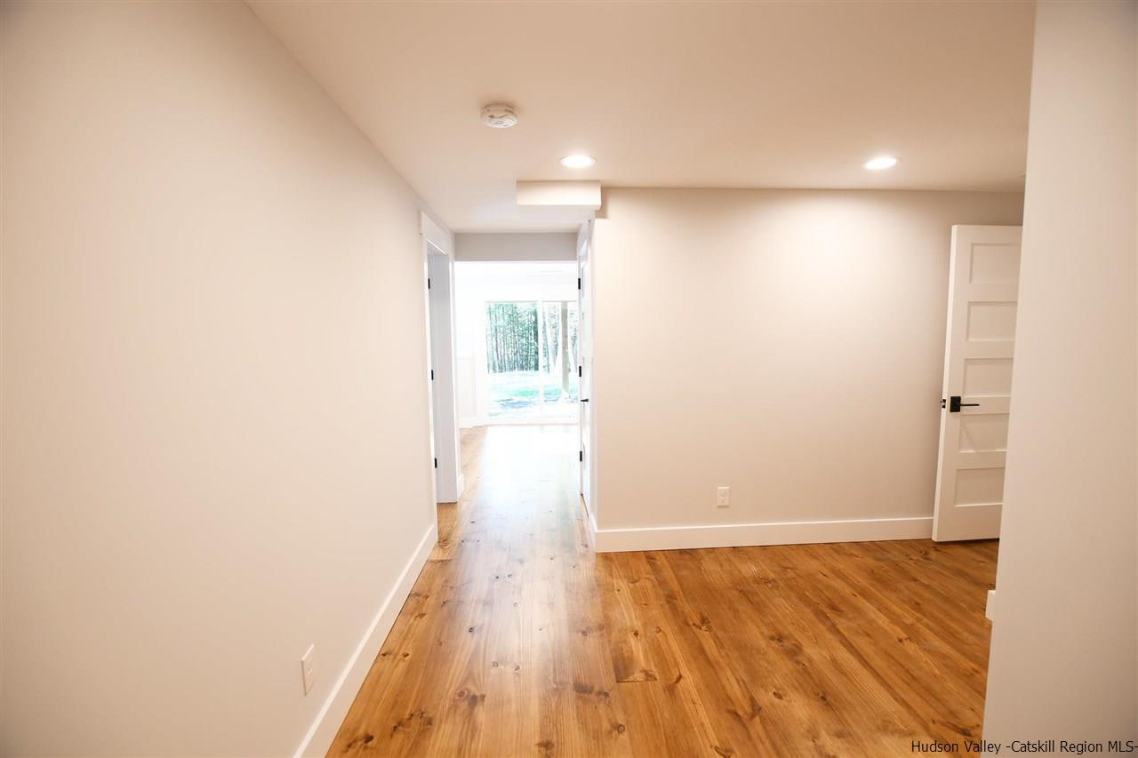 259 Rivka Road Saugerties, NY 12477 - Photo 22 of 29 a view of hallway with wooden floor