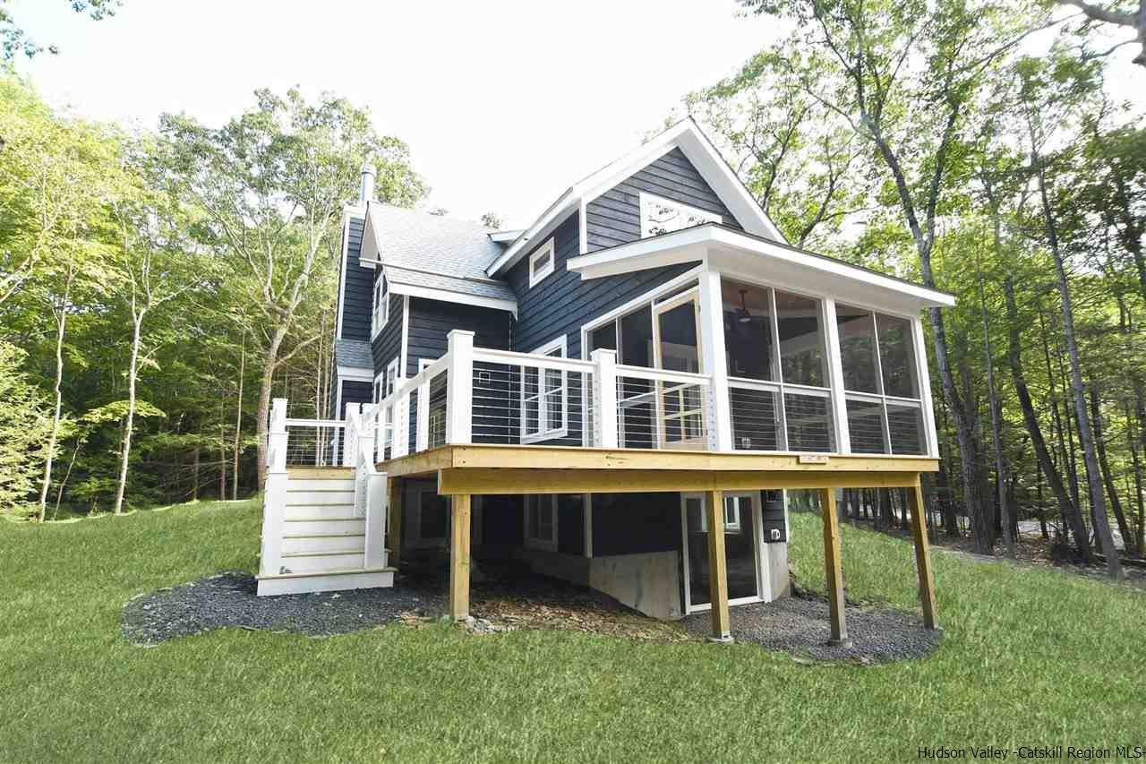259 Rivka Road Saugerties, NY 12477 - Photo 25 of 29 a front view of a house with a yard