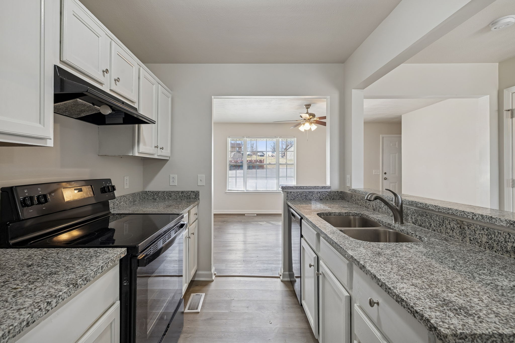 2607 Landrum Court Springfield, TN 37172 - Photo 18 of 37 a kitchen with stainless steel appliances granite countertop a sink stove and cabinets