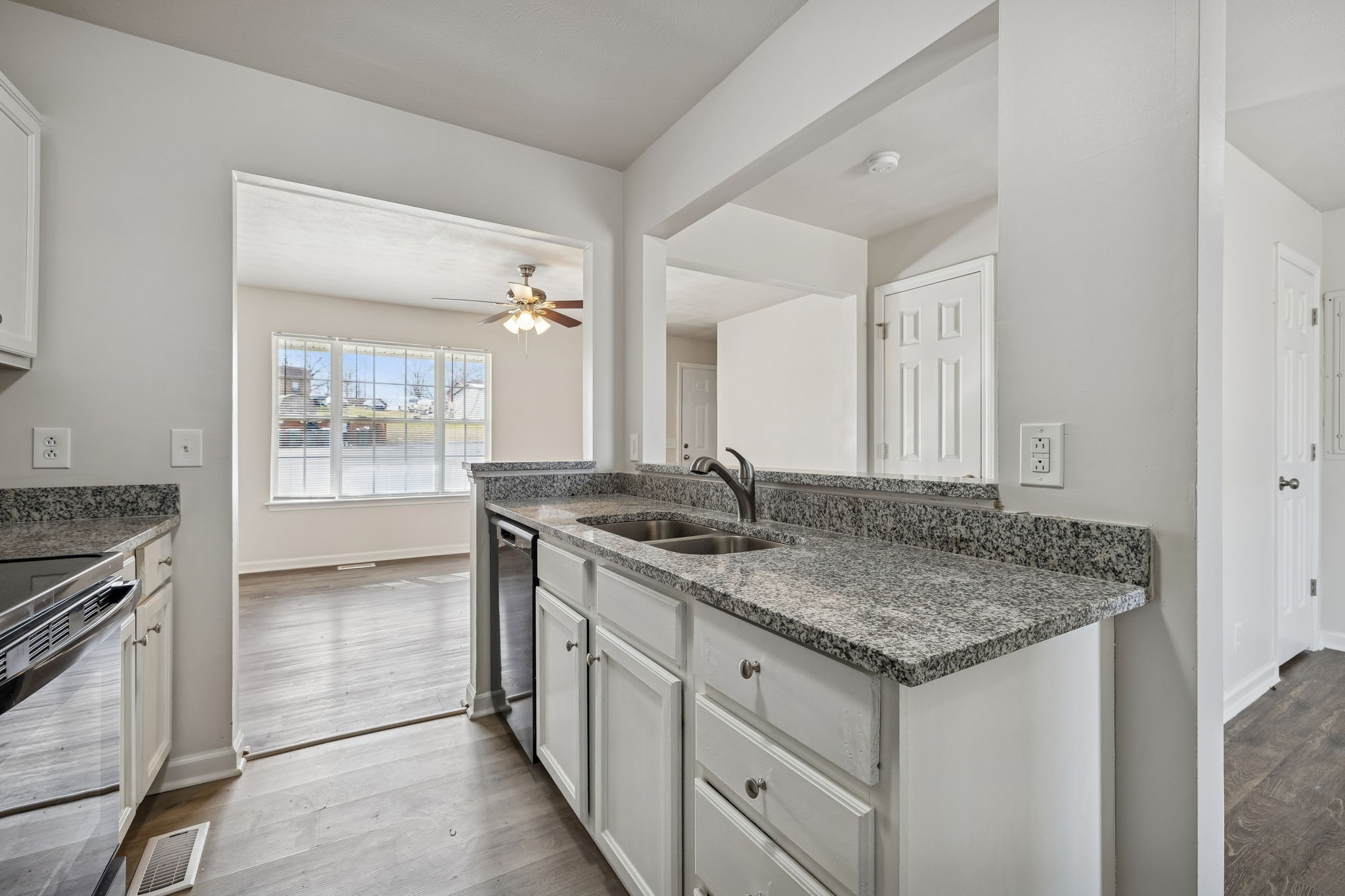 2607 Landrum Court Springfield, TN 37172 - Photo 19 of 37 a bathroom with a granite countertop sink and a mirror