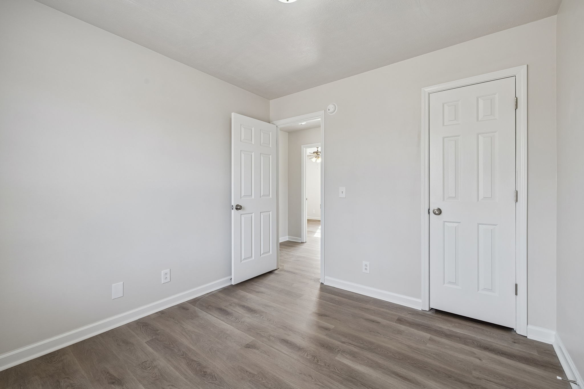 2607 Landrum Court Springfield, TN 37172 - Photo 23 of 37 a view of an empty room with wooden floor