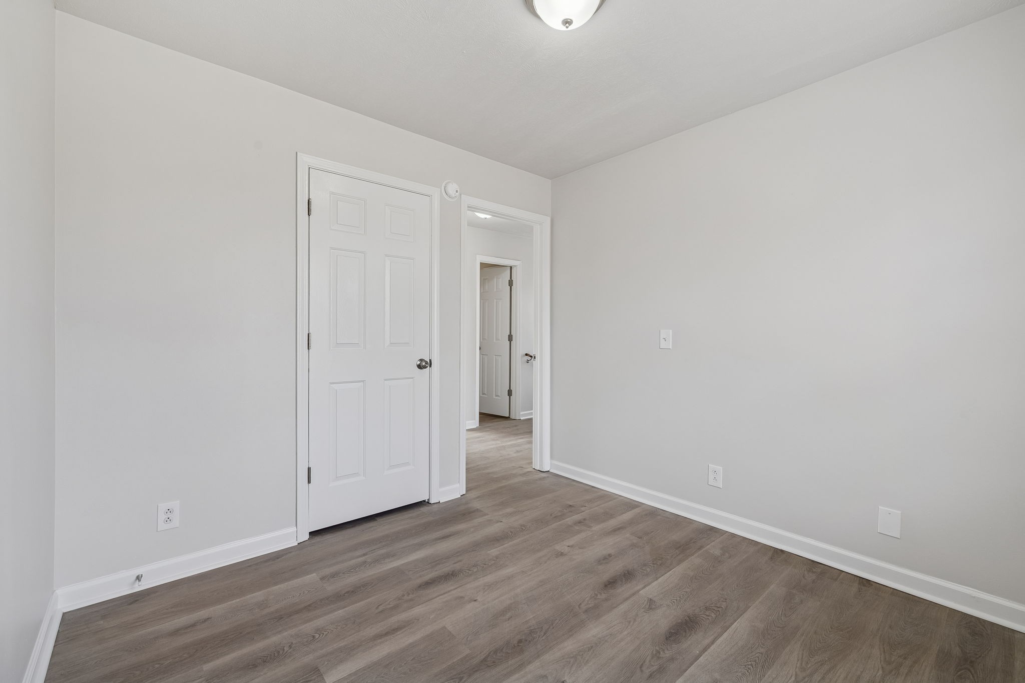 2607 Landrum Court Springfield, TN 37172 - Photo 25 of 37 a view of an empty room with wooden floor