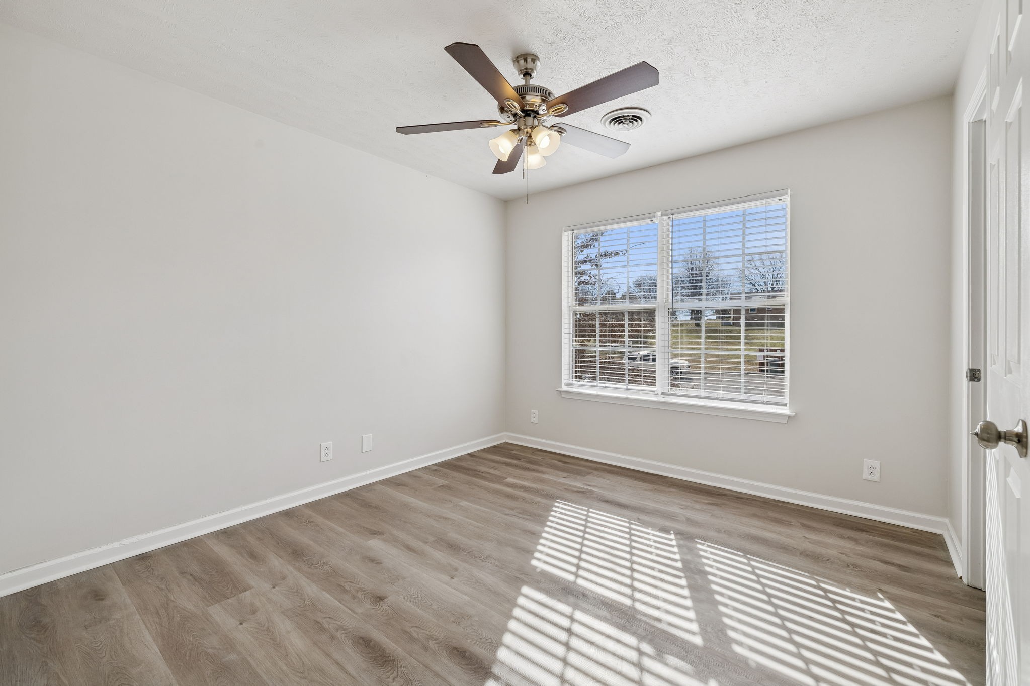 2607 Landrum Court Springfield, TN 37172 - Photo 26 of 37 a view of a livingroom with a ceiling fan and window