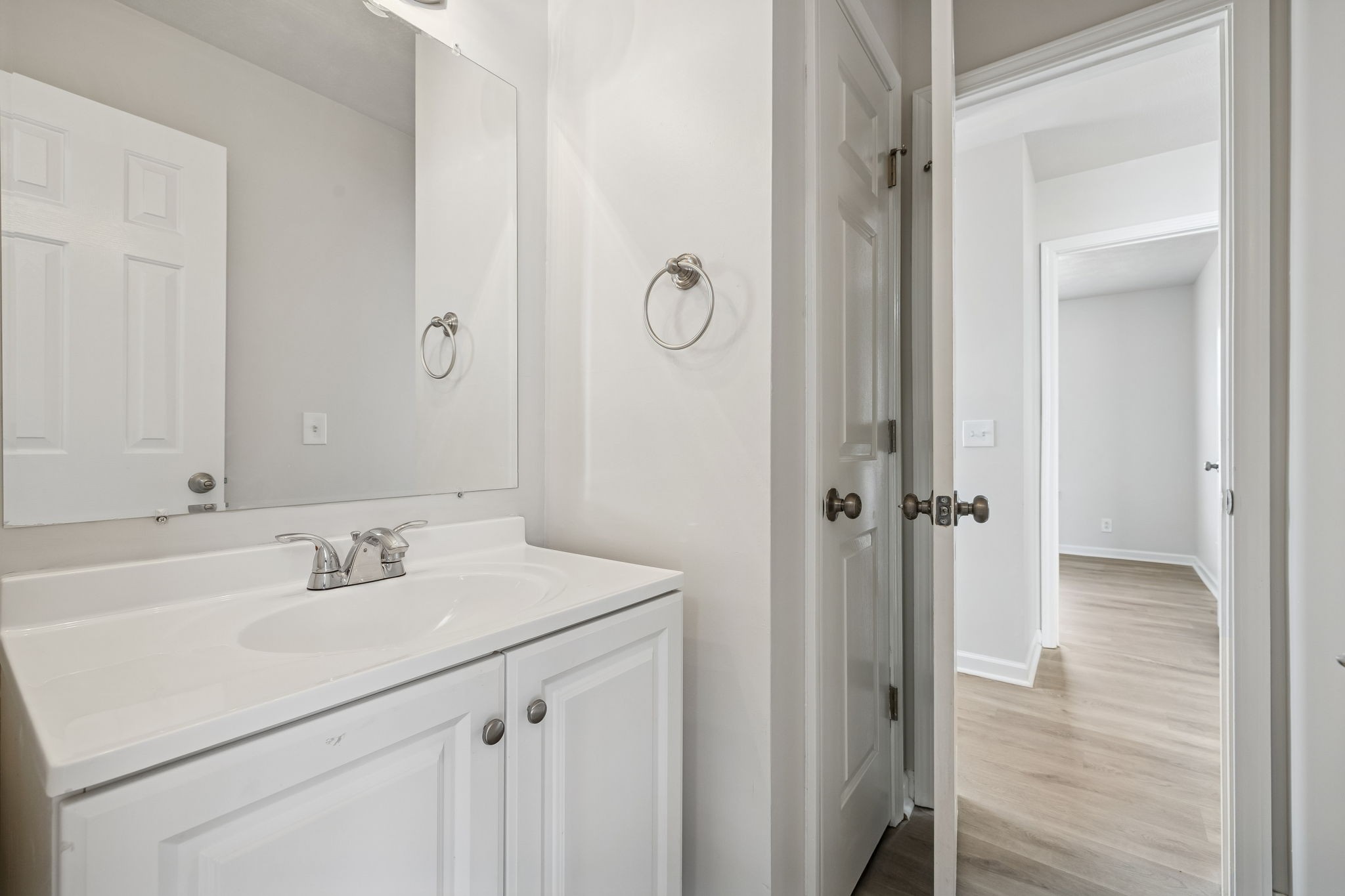 2607 Landrum Court, Unit 16 Springfield, TN 37172 - Photo 28 of 30 a bathroom with a sink and a mirror