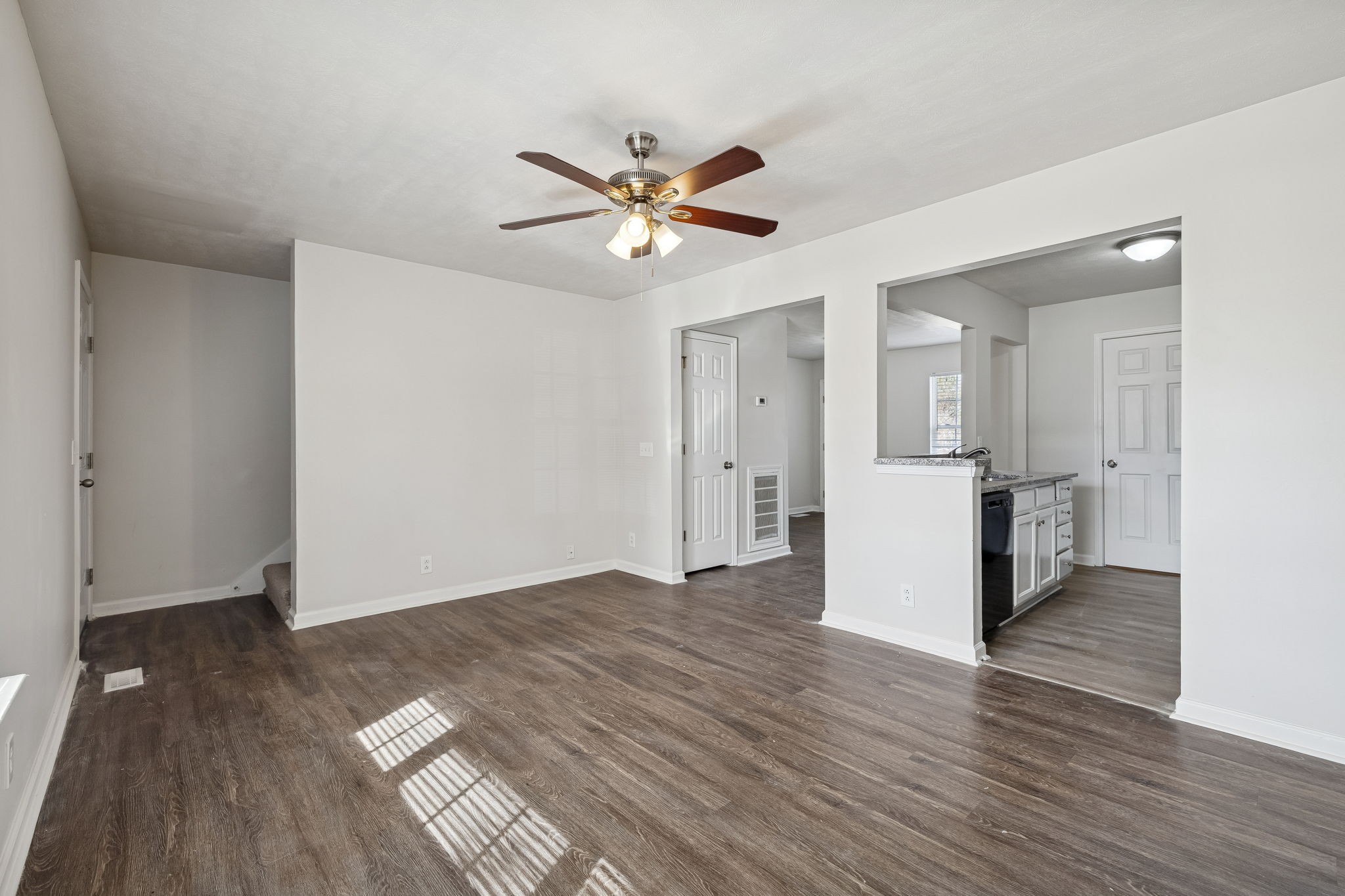 2607 Landrum Court Springfield, TN 37172 - Photo 10 of 37 a view of empty room with wooden floor and sink