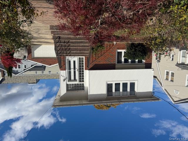 a front view of a house with street