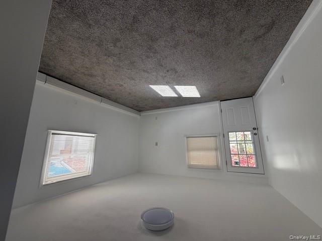 306 Hamilton Avenue, Unit 1 Hewlett, NY 11557 - Photo 2 of 18 an empty room with a window