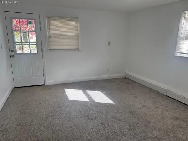 an empty room with windows