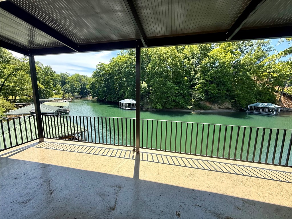 1200 Loran Pointe Circle Seneca, SC 29672 - Photo 10 of 29 This outdoor space offers direct views of the serene lake and lush surrounding trees.