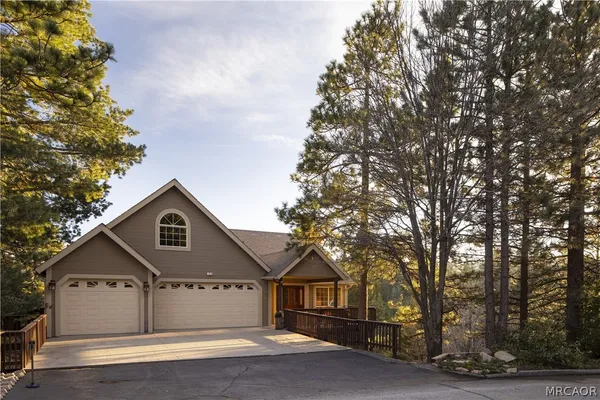 a front view of a house with garage