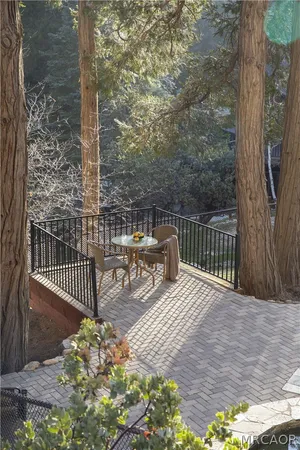 a view of balcony with wooden floor