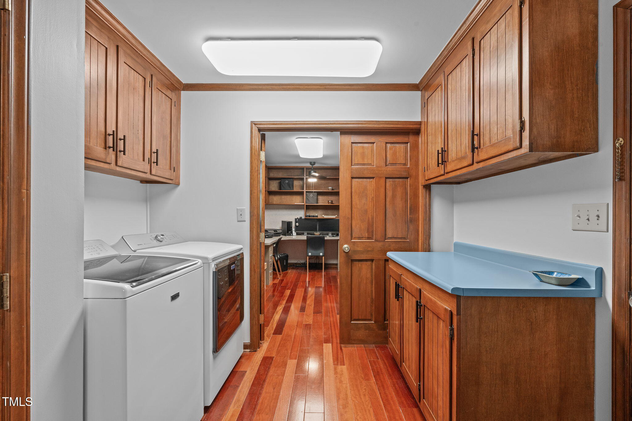 411 Tant Road Zebulon, NC 27597 - Photo 27 of 48 a kitchen that has a sink and a stove in it