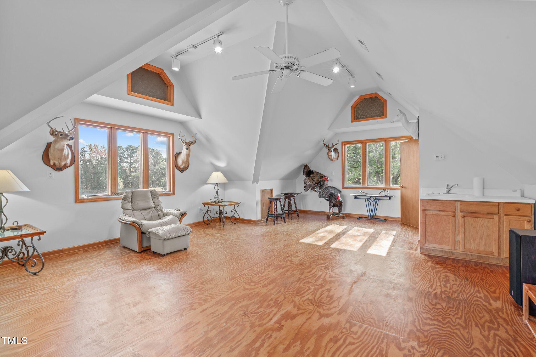 411 Tant Road Zebulon, NC 27597 - Photo 29 of 48 a living room with furniture and a window