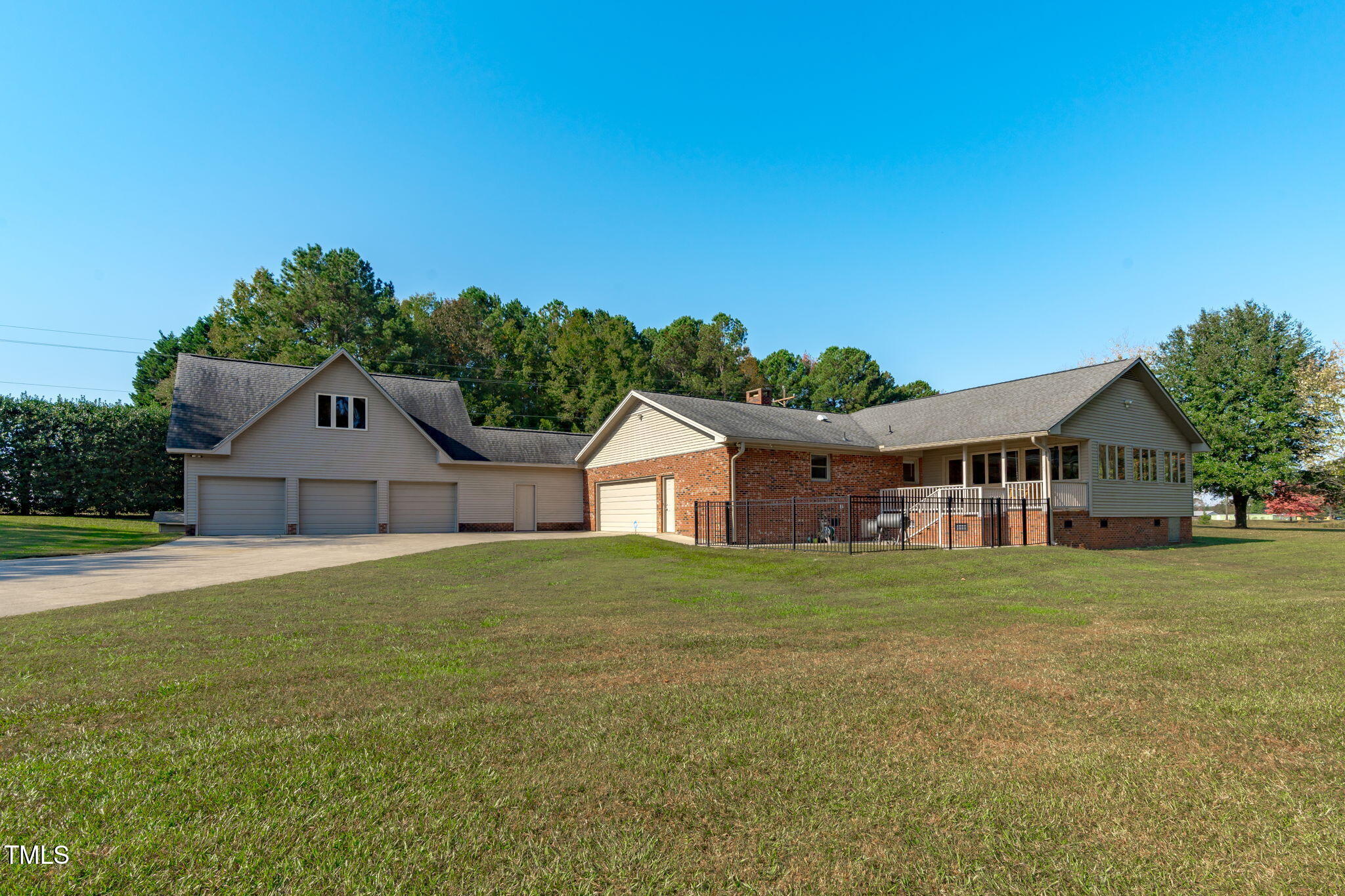411 Tant Road Zebulon, NC 27597 - Photo 33 of 48 a front view of a house with a yard