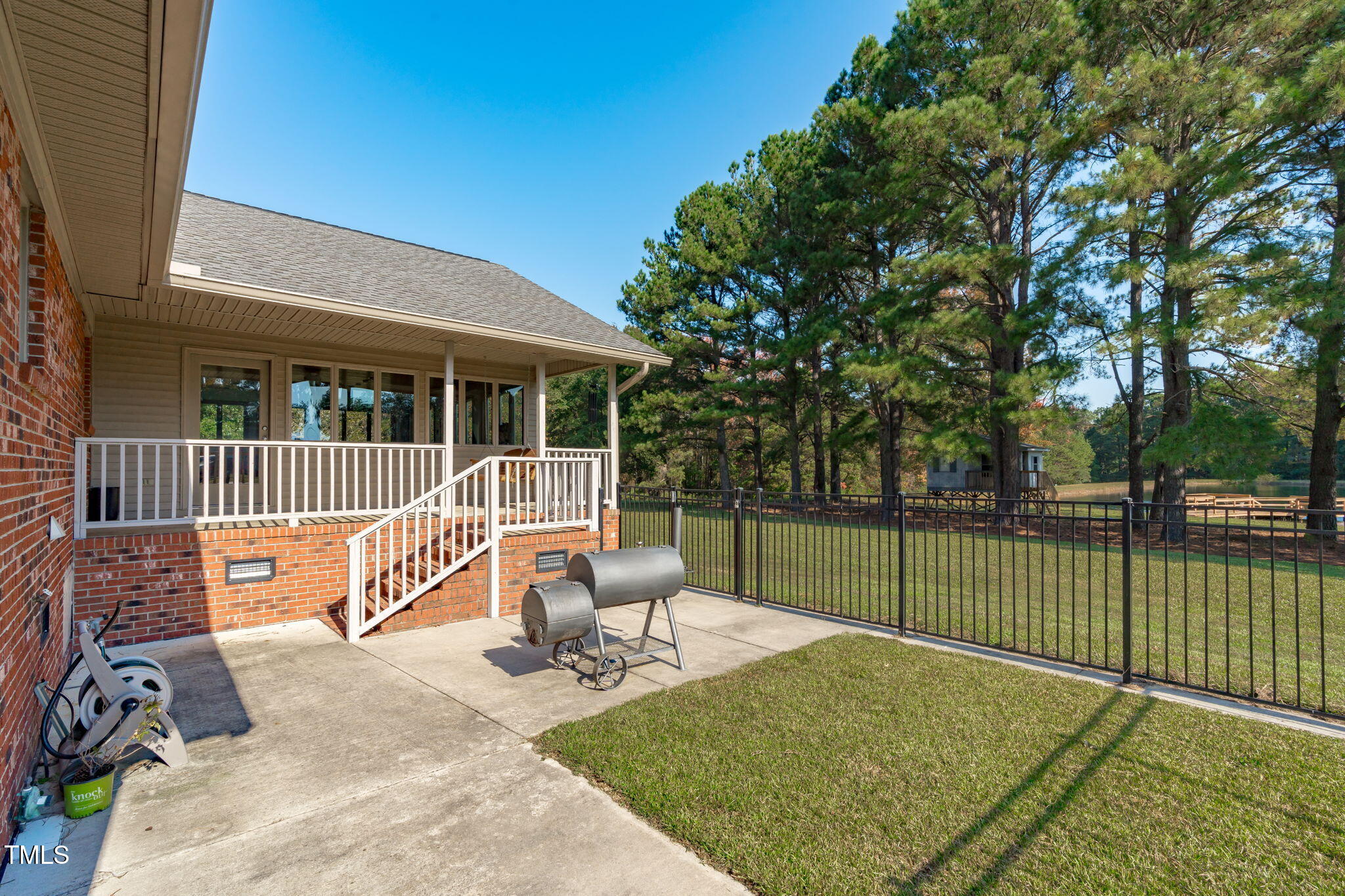 411 Tant Road Zebulon, NC 27597 - Photo 34 of 48 a view of a deck with a slide