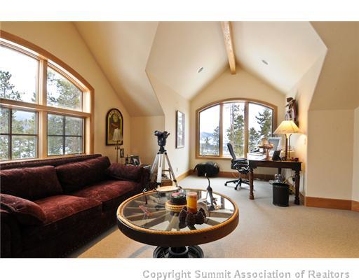 317 Mountain Bluebell Road Keystone, CO 80435 - Photo 11 of 25 a living room with furniture and a large window
