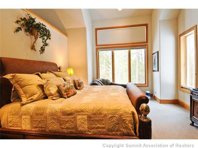 317 Mountain Bluebell Road Keystone, CO 80435 - Photo 15 of 25 a bedroom with a bed and a window