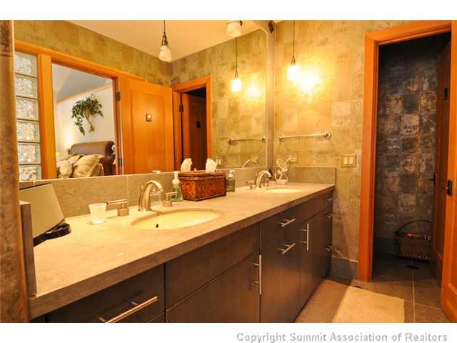 317 Mountain Bluebell Road Keystone, CO 80435 - Photo 21 of 25 a bathroom with a sink and a mirror