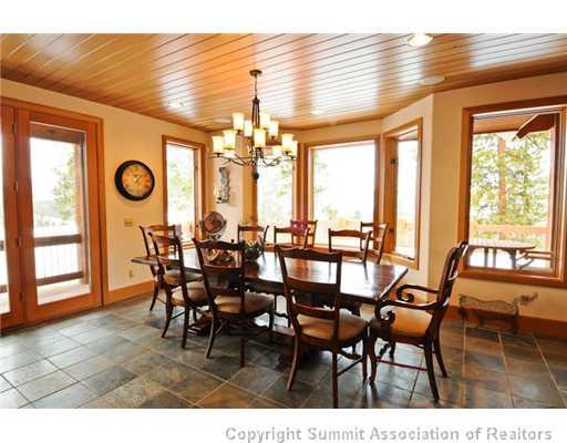 317 Mountain Bluebell Road Keystone, CO 80435 - Photo 9 of 25 a view of a dining room with furniture and chandelier