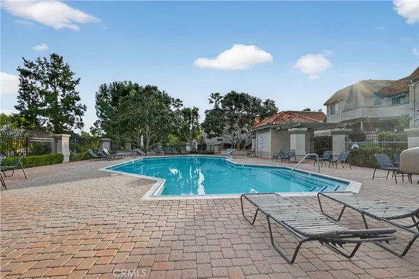 a view of a house with swimming pool