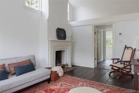 a hallway with a washer and dryer