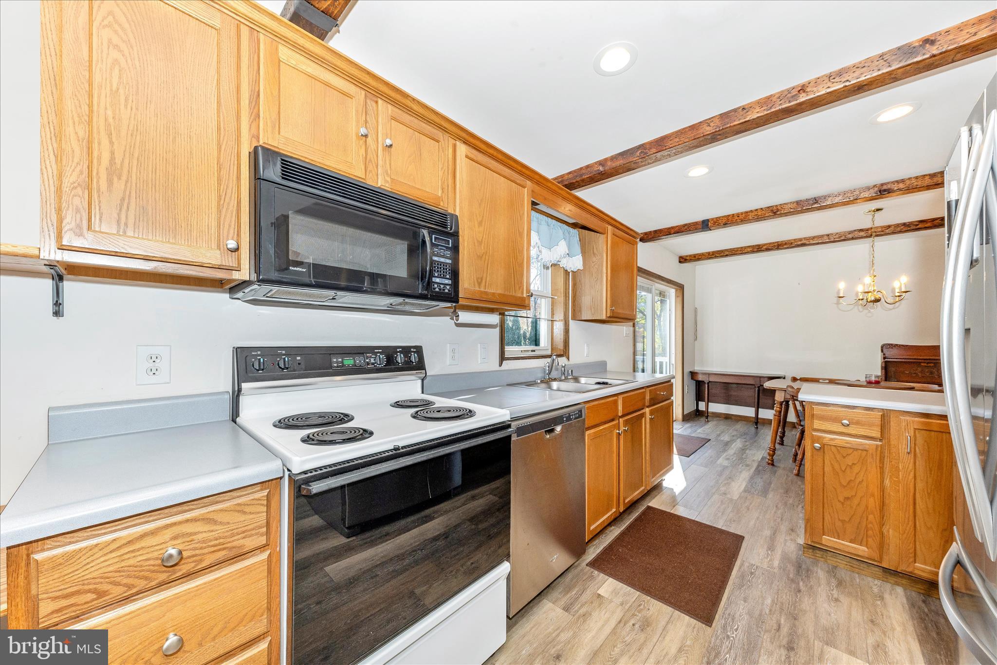 7 Colleen Trail Fairfield, PA 17320 - Photo 13 of 47 a kitchen with stainless steel appliances granite countertop a stove and a microwave