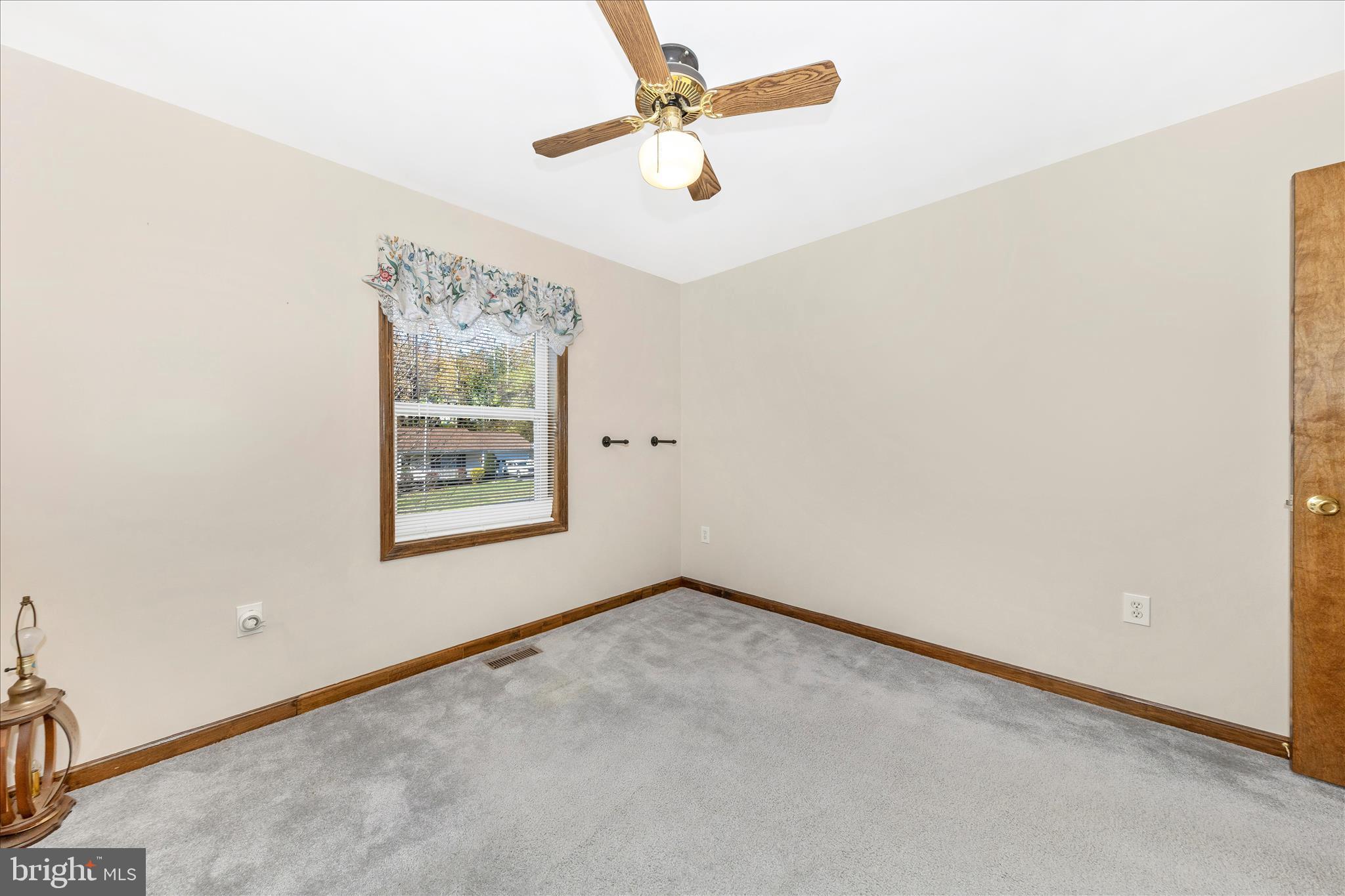 7 Colleen Trail Fairfield, PA 17320 - Photo 21 of 47 an empty room with windows and fan
