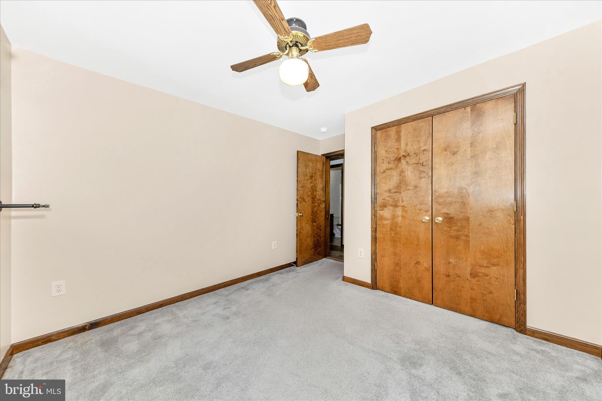 7 Colleen Trail Fairfield, PA 17320 - Photo 22 of 47 an empty room with closet and a chandelier fan