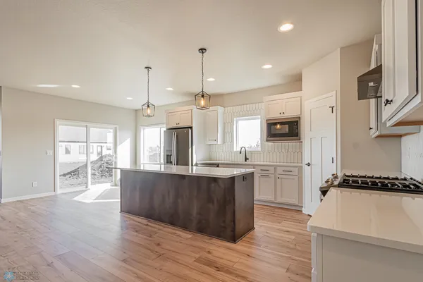 $590,000 | 5868 Ellis Drive West, West Fargo, ND 58078
