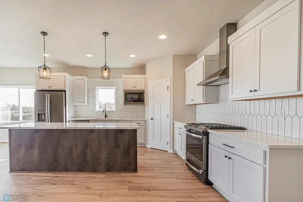 $590,000 | 5868 Ellis Drive West, West Fargo, ND 58078