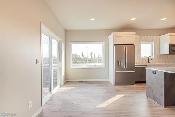 $590,000 | 5868 Ellis Drive West, West Fargo, ND 58078