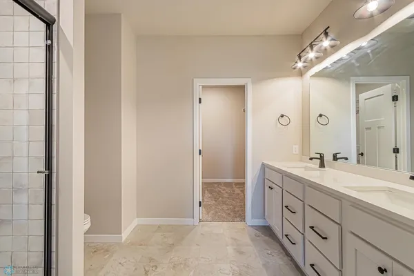 $590,000 | 5868 Ellis Drive West, West Fargo, ND 58078