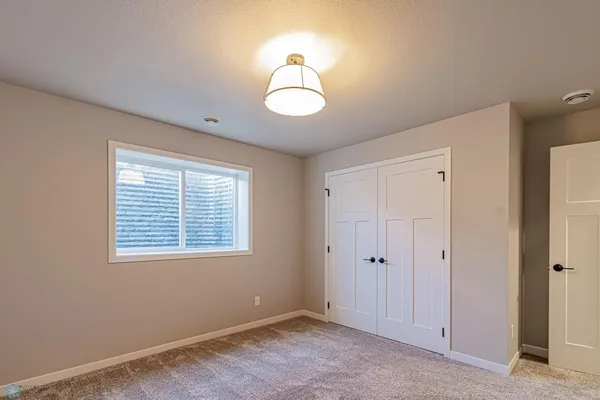 $590,000 | 5868 Ellis Drive West, West Fargo, ND 58078