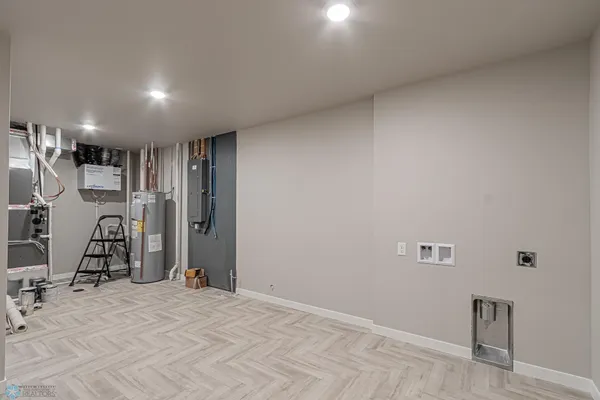 $590,000 | 5868 Ellis Drive West, West Fargo, ND 58078